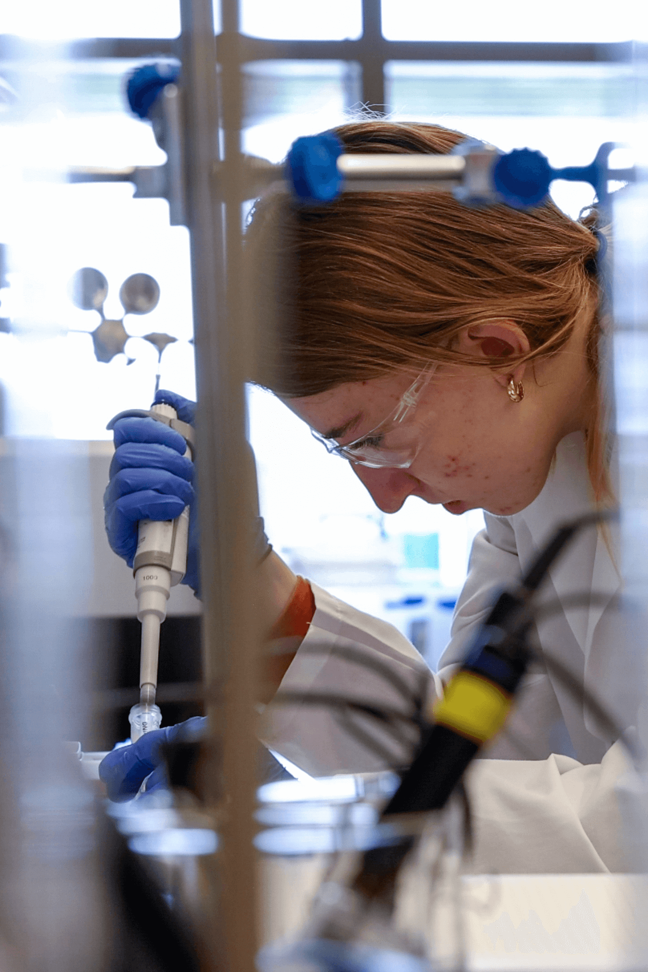 A student works with a pipette