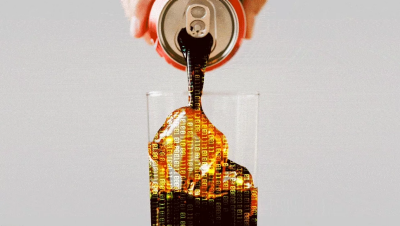 A hand pouring a coke into a glass with digital symbols pouring out of the can