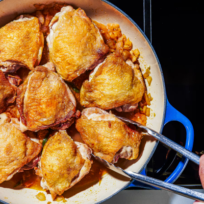 Chicken cooking in a pan