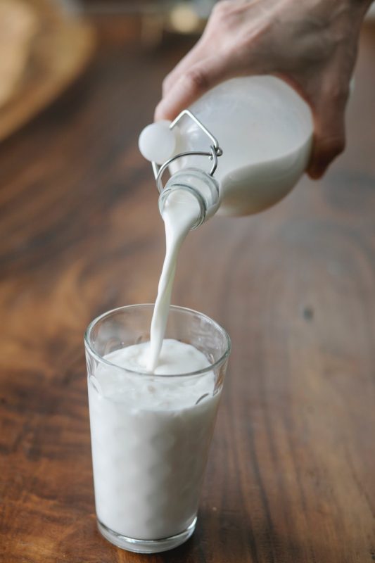 Glass of milk being poured